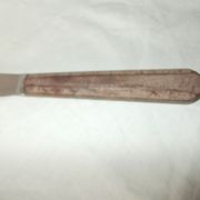 Set of knives with brown Bakelite handles.