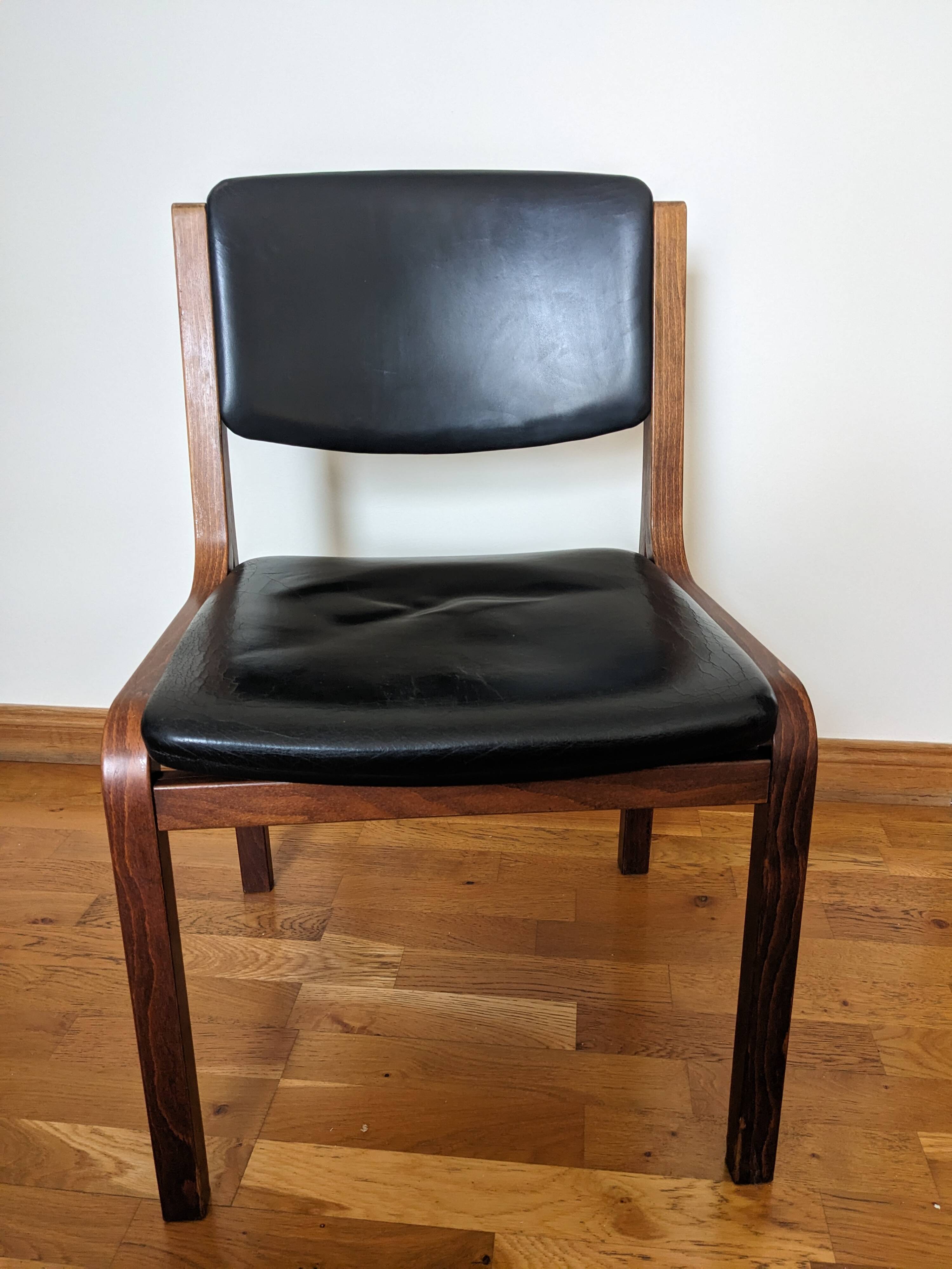 Vintage leather and wood chair pair