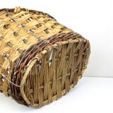 Large braided basket of different types of strands