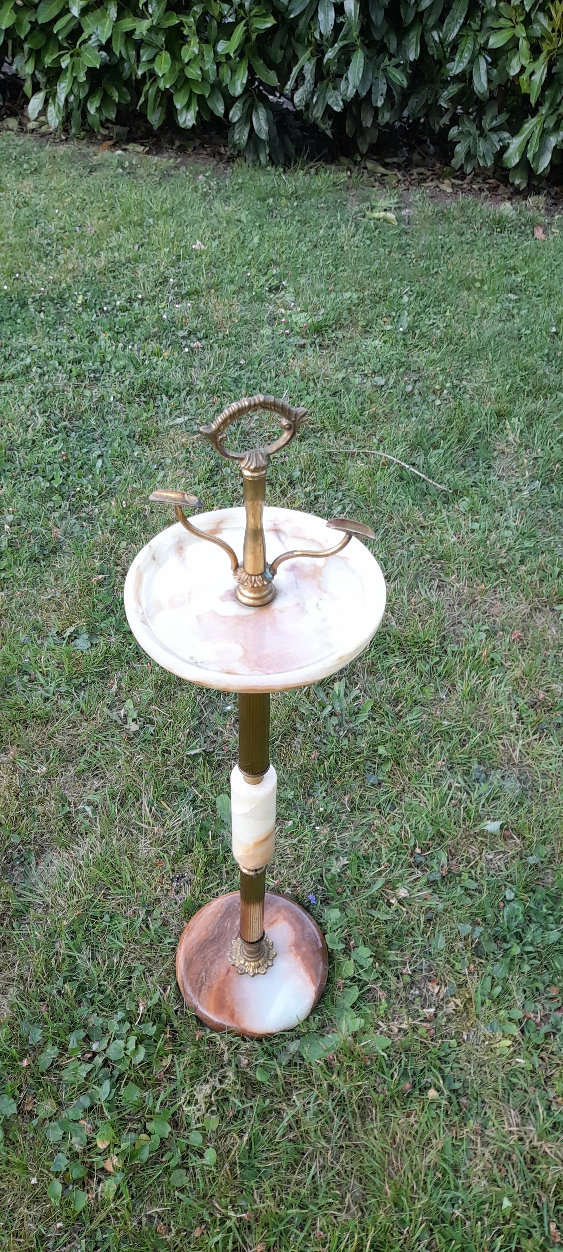 Standing ashtray and laying cigarettes, brass and marble, early XXth