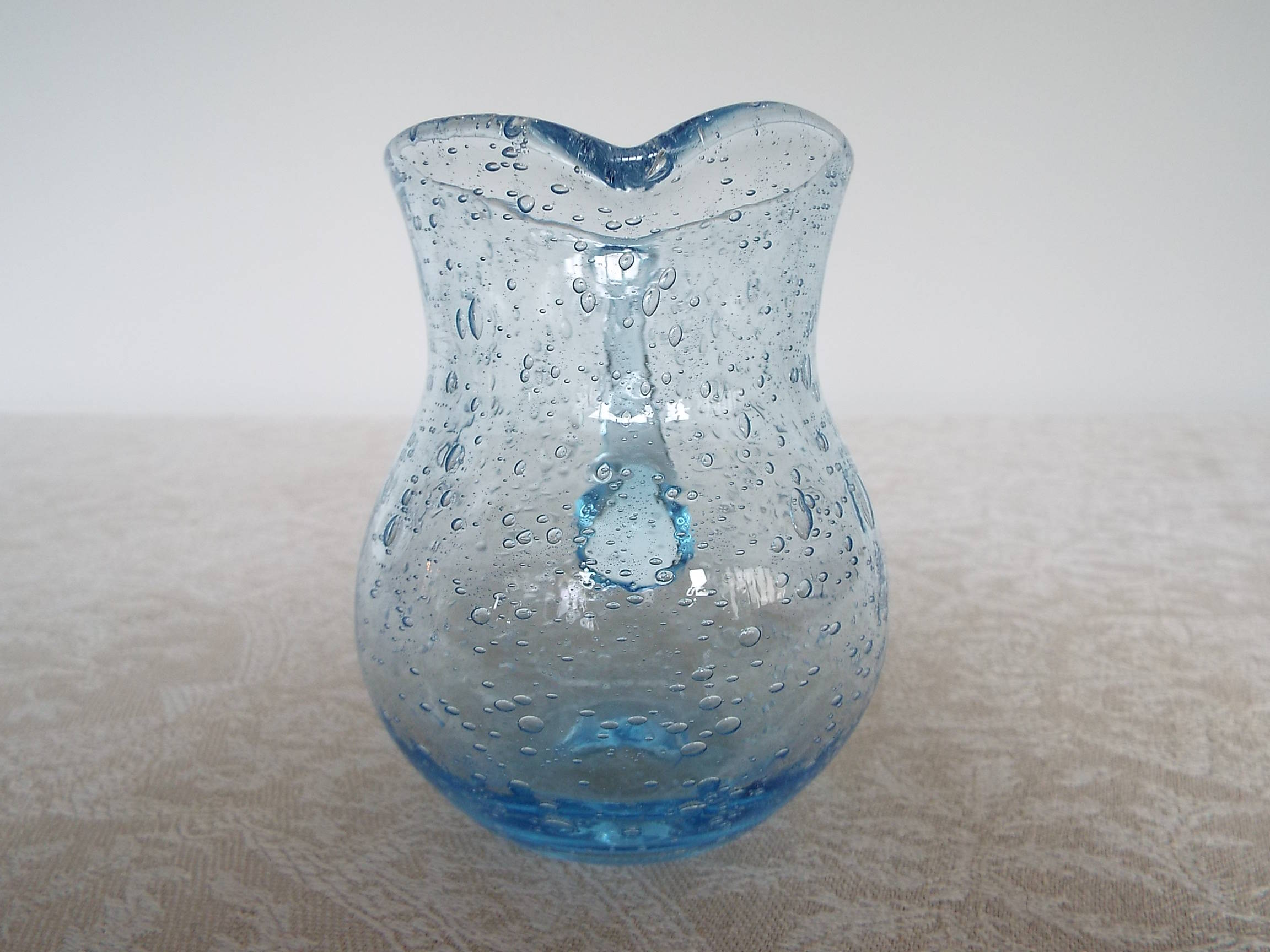 Bulled glass pitcher