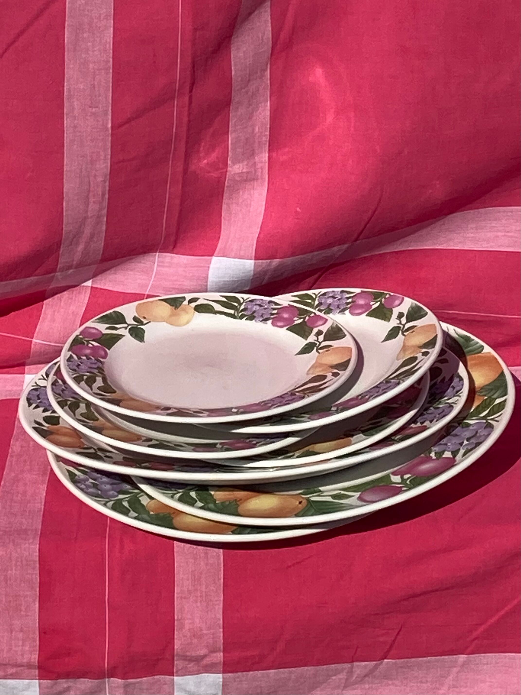 Old plates with fruit decoration