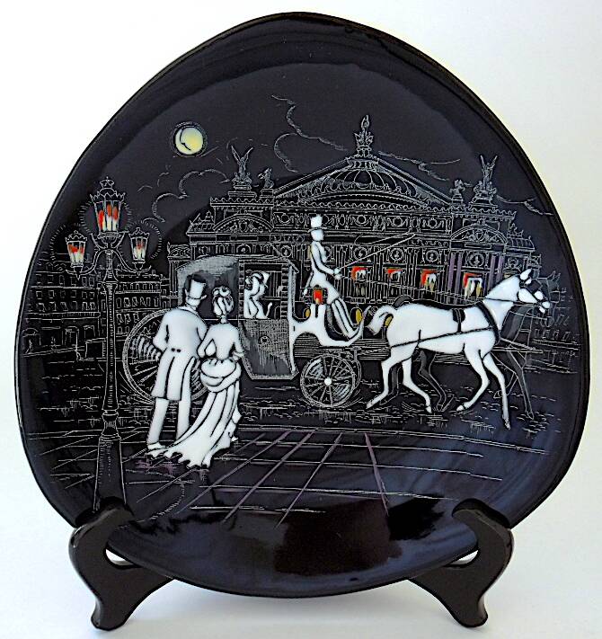 Pair of decorative plates: "Rally" & "Bal at the Opera".