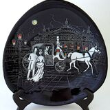 Pair of decorative plates: "Rally" & "Bal at the Opera".