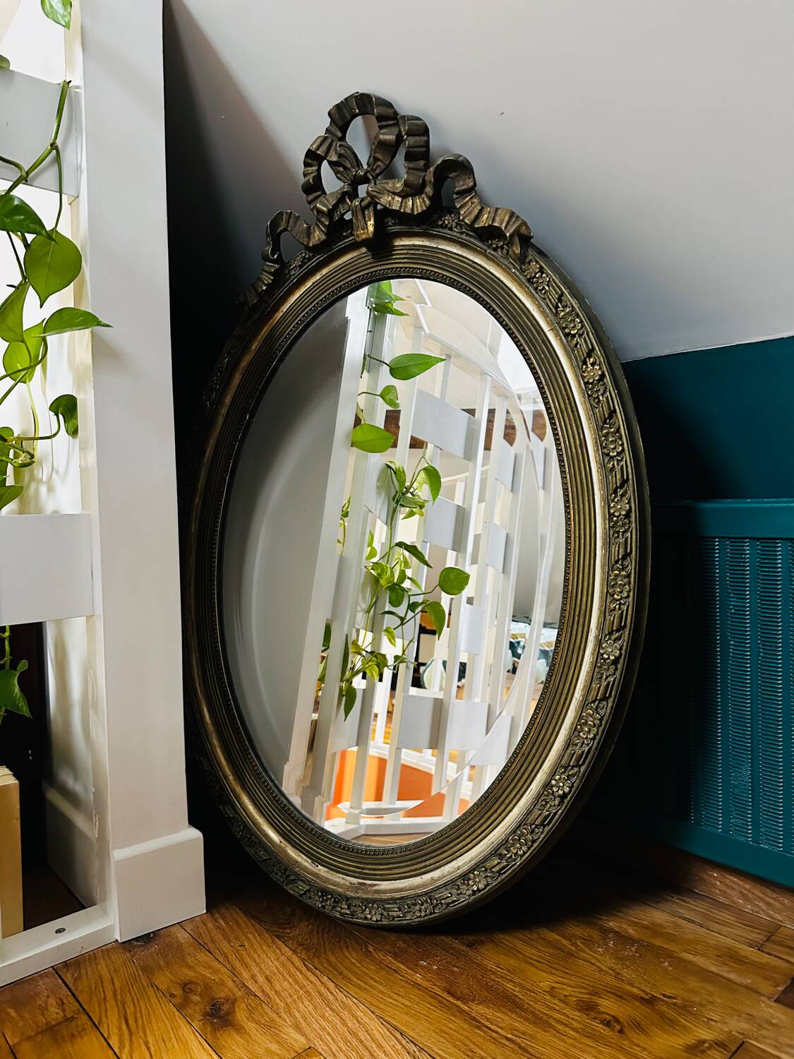 Large antique oval mirror