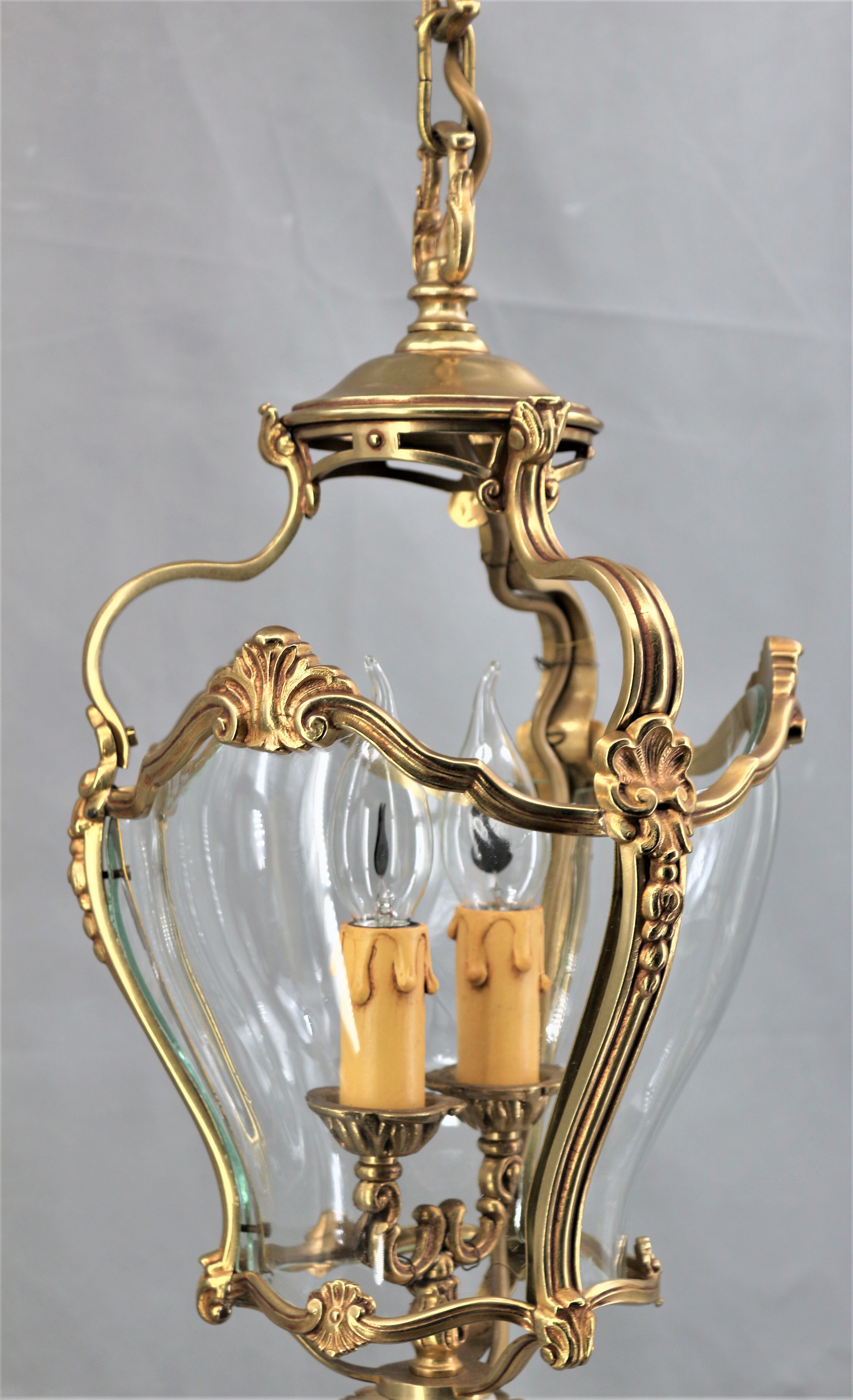 Lustre en bronze et verre bombé