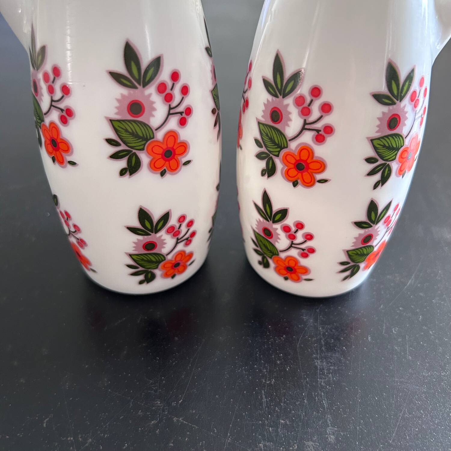 Pair of floral-decorated bottles