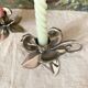 Pair of silver metal flower candle holders