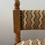 Pair of wooden chairs with herringbone fabric