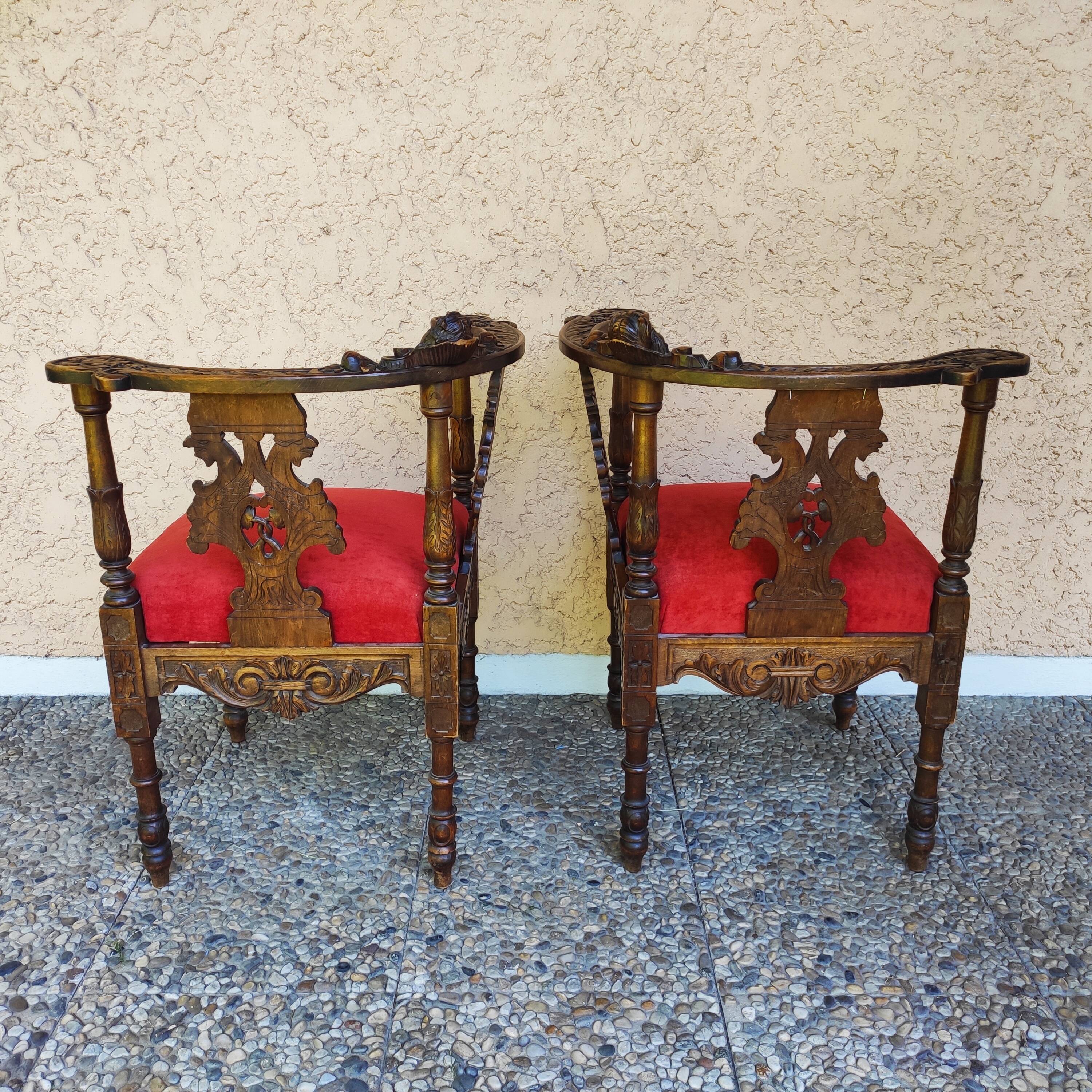 Pair of neo-Renaissance Henri II corner armchairs in carved wood, 19th century.