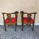 Pair of neo-Renaissance Henri II corner armchairs in carved wood, 19th century.