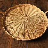 Round wicker tray with two vintage basketwork handles