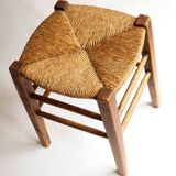 Old stool with straw seat