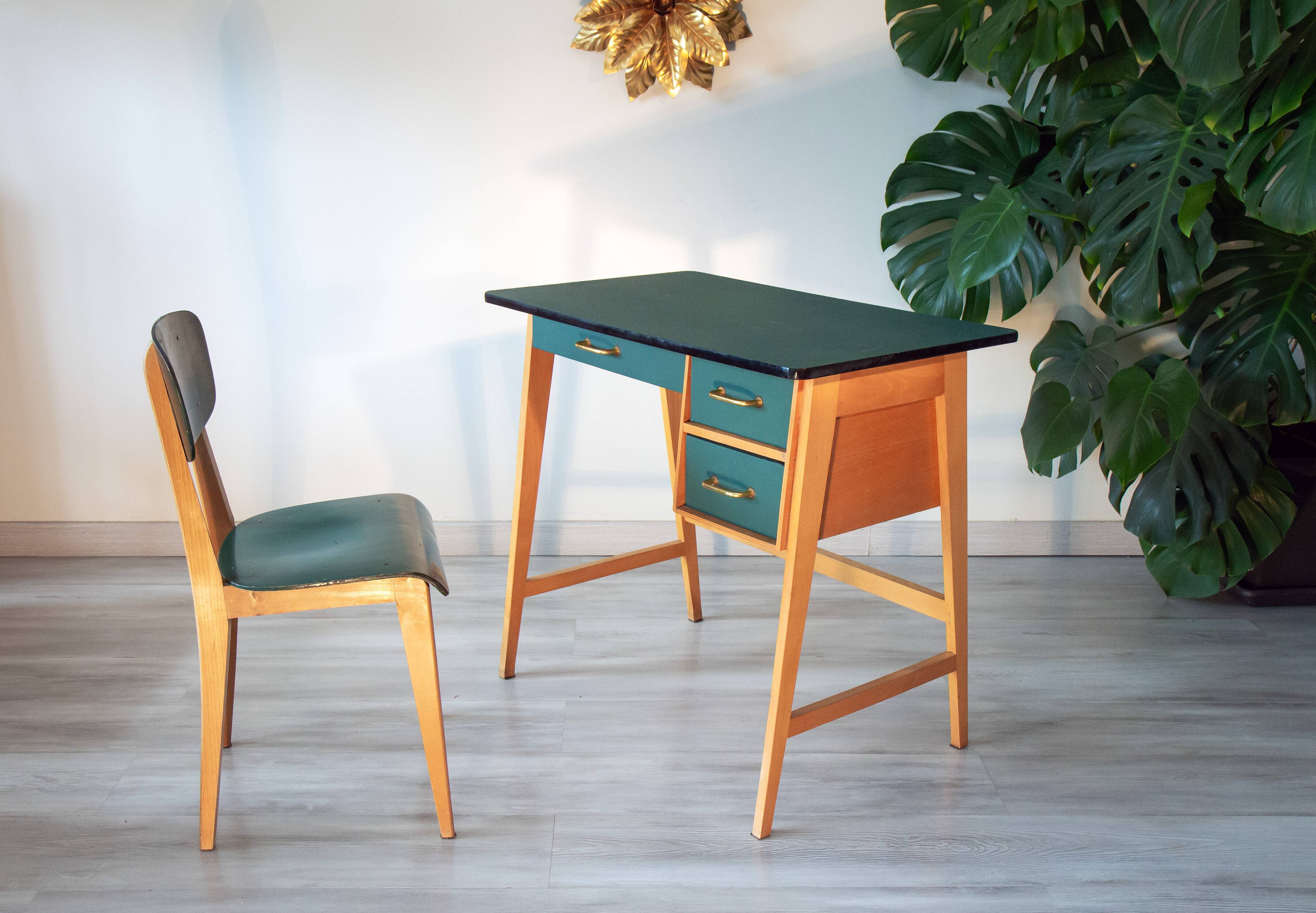 Desk and its green and wood chair, 1950s