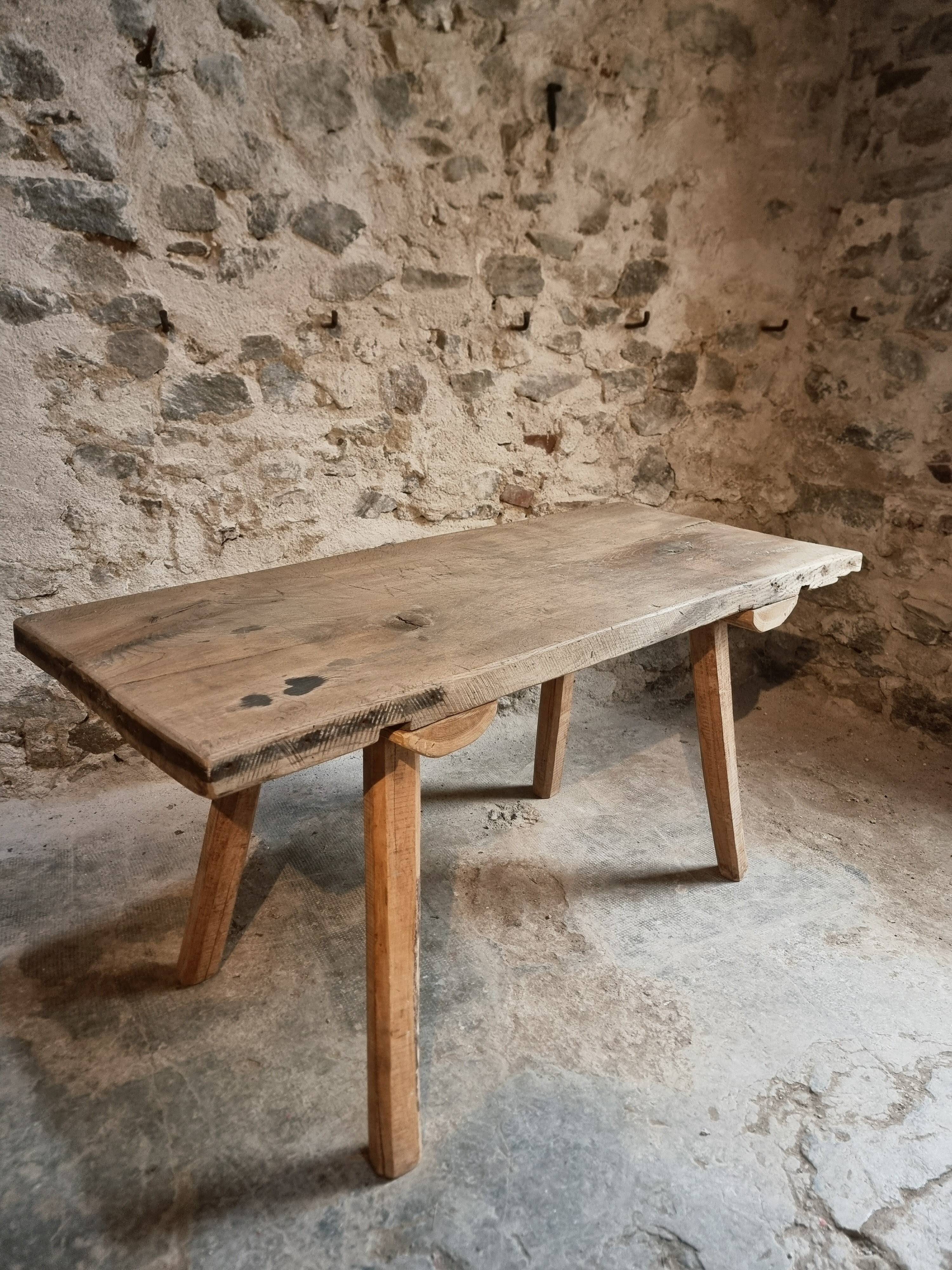 Antique work table / primitive dining table in oak, Hungary, circa 1900–1930.