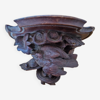 Carved wooden wall console.