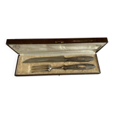 Service of silver leg cutlery in their case