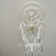 Brass chandelier with patinated tassels