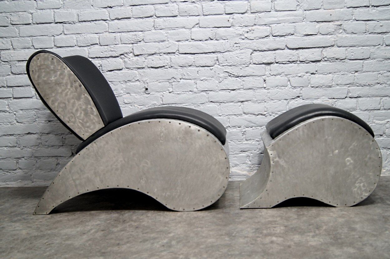 Industrial aluminum & vinyl lounge chair with footrest, 1970s