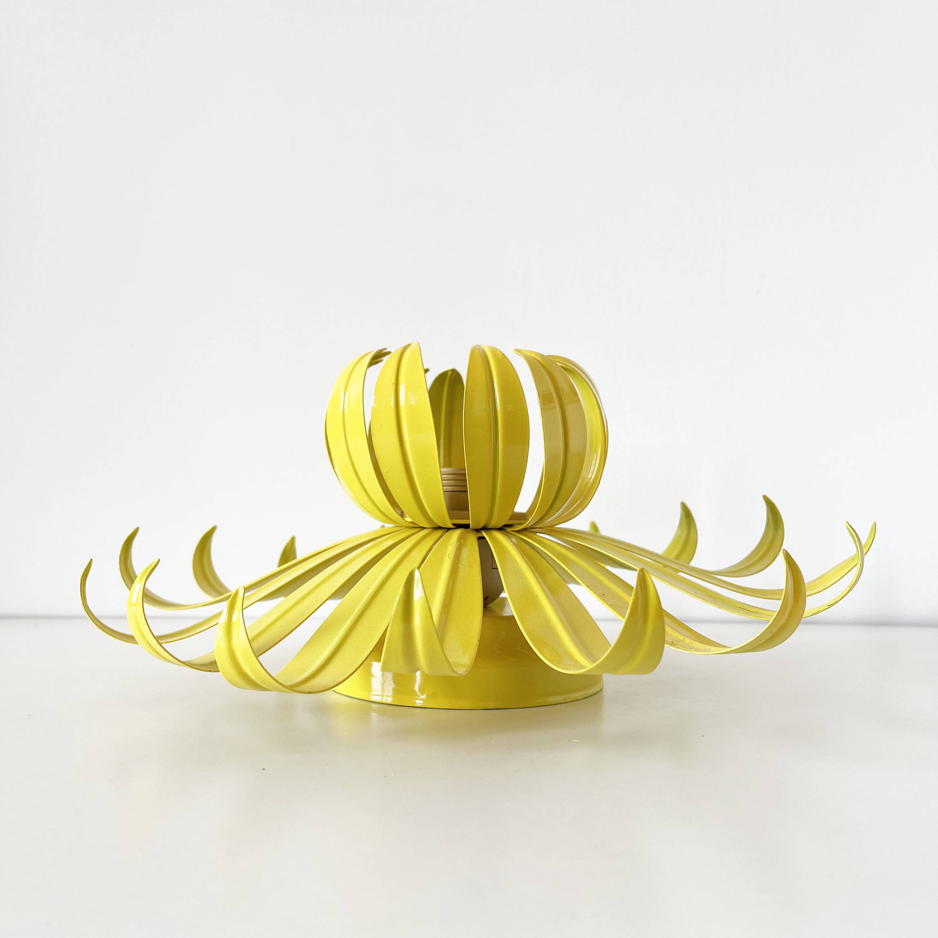 Vintage yellow metal flower wall light