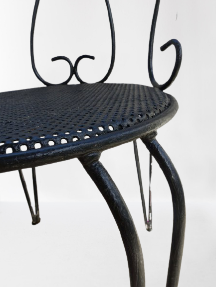 Pair of wrought iron garden chairs
