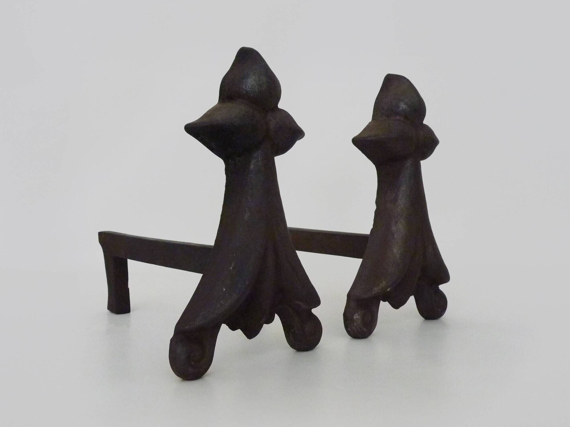 Pair of cast iron fireplace andirons. France, 19th century.