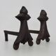 Pair of cast iron fireplace andirons. France, 19th century.