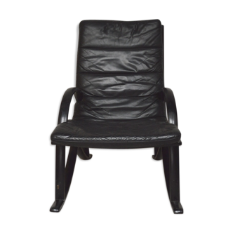 Black leather armchair and canning