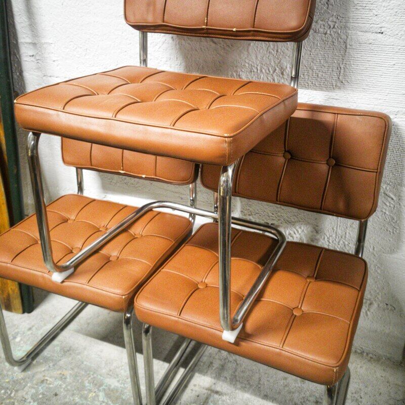 Pair of cantilever chrome and skaï chairs