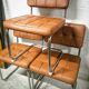 Pair of cantilever chrome and skaï chairs