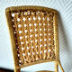 Vintage rattan doll chair