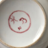 Old white and pink teapot