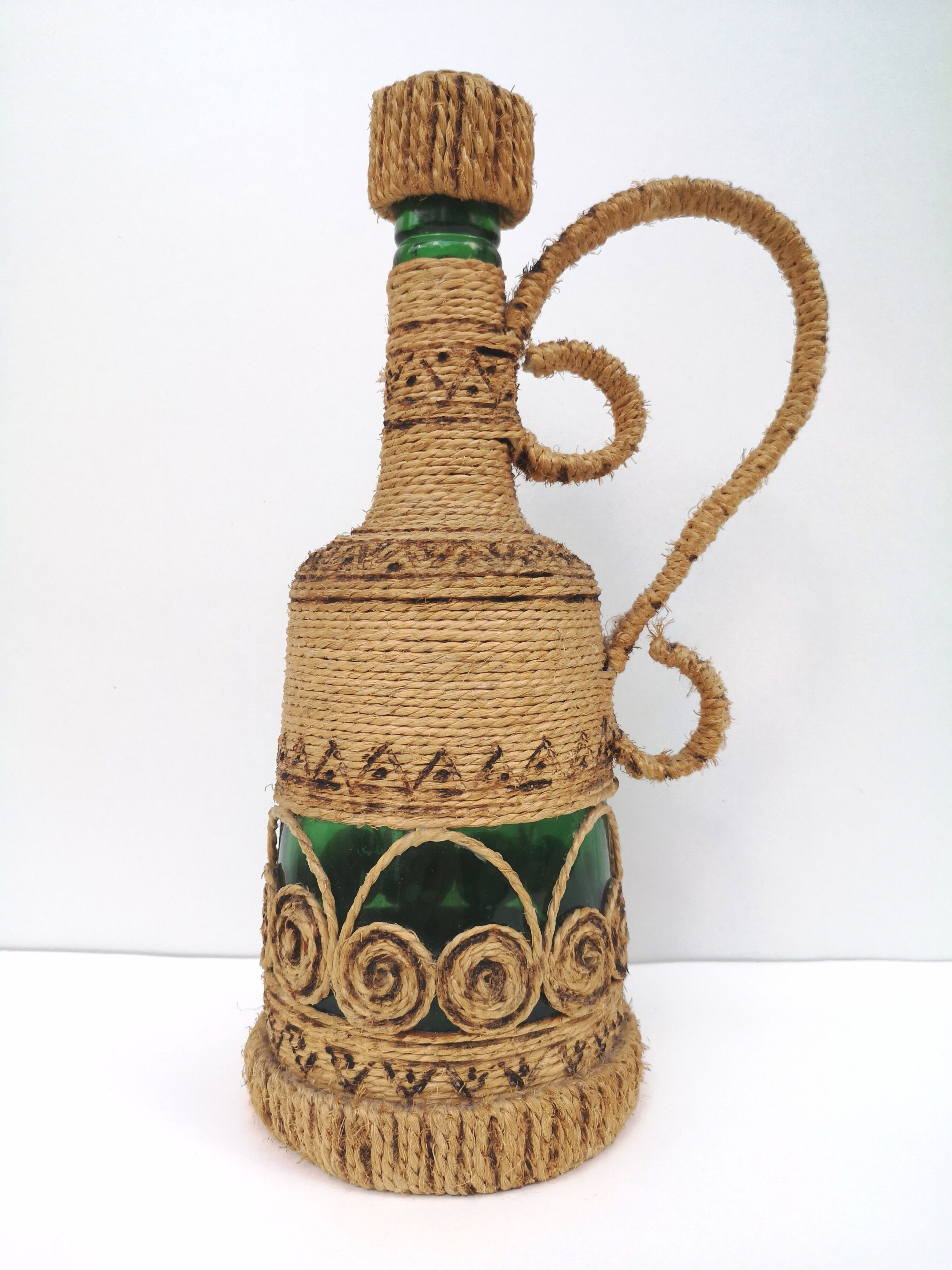 Vintage decorative rope bottle