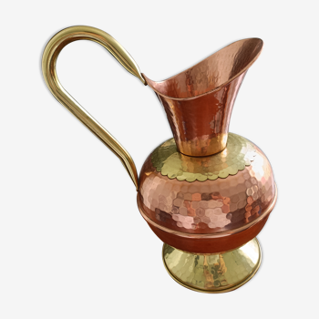 Old pitcher in hammered copper Villedieu