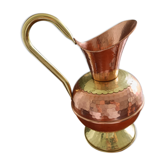 Old pitcher in hammered copper Villedieu