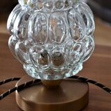 Glass globe-laying lamp with large bubbles