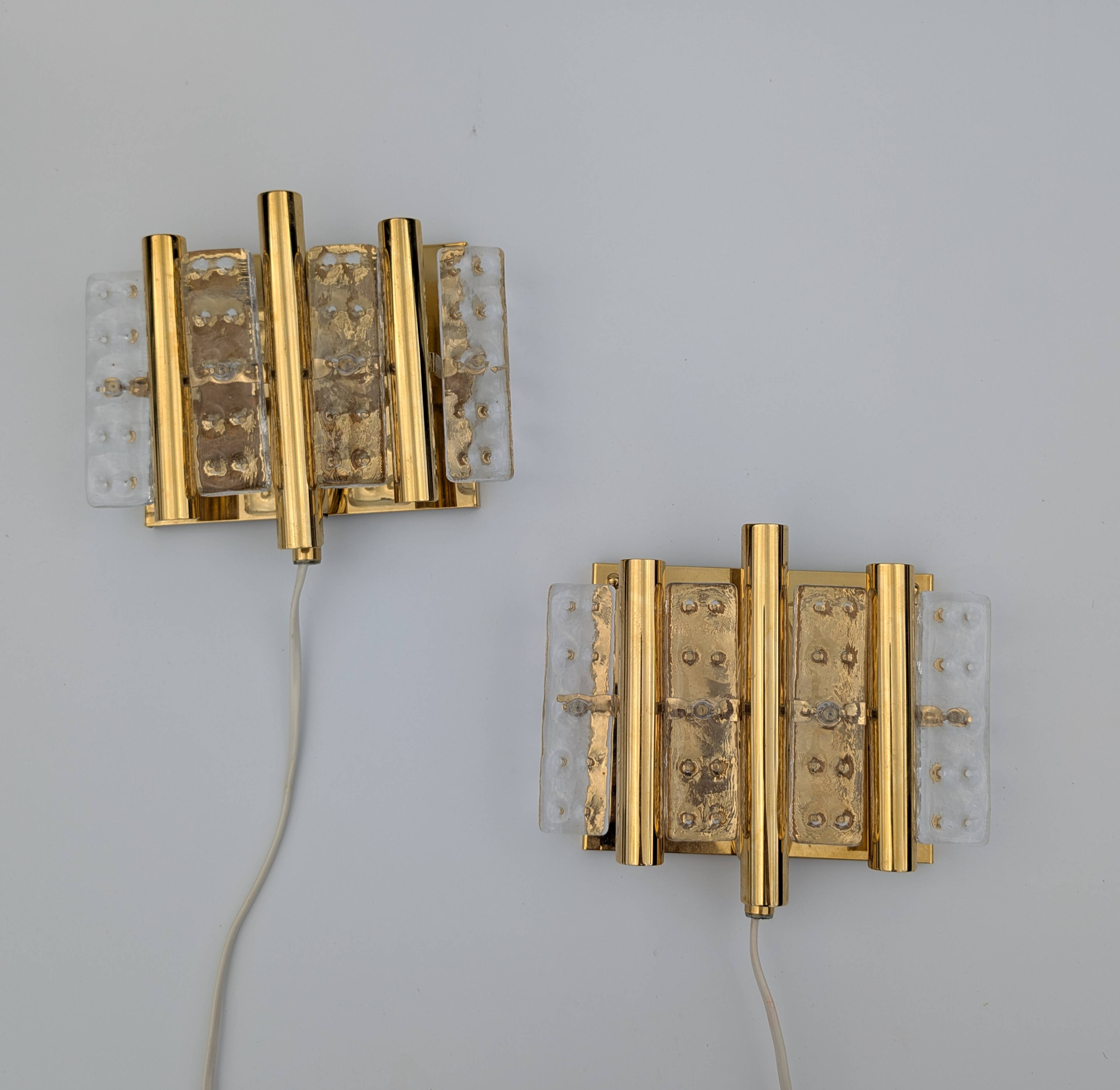 Pair of Hans-Agne Jakobsson wall lights in brass and pressed glass