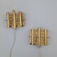 Pair of Hans-Agne Jakobsson wall lights in brass and pressed glass