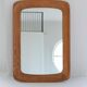 Mid-century modern sculptural wall mirror in stained oak, glass, Glas & Trä 1959