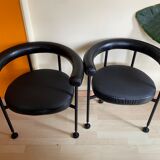 Pair of vintage leather basket armchairs