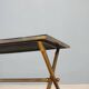 Coffee table from the 1950s-60s with a brass base.