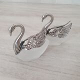 Two frosted glass swan salt cellars with silver plating.