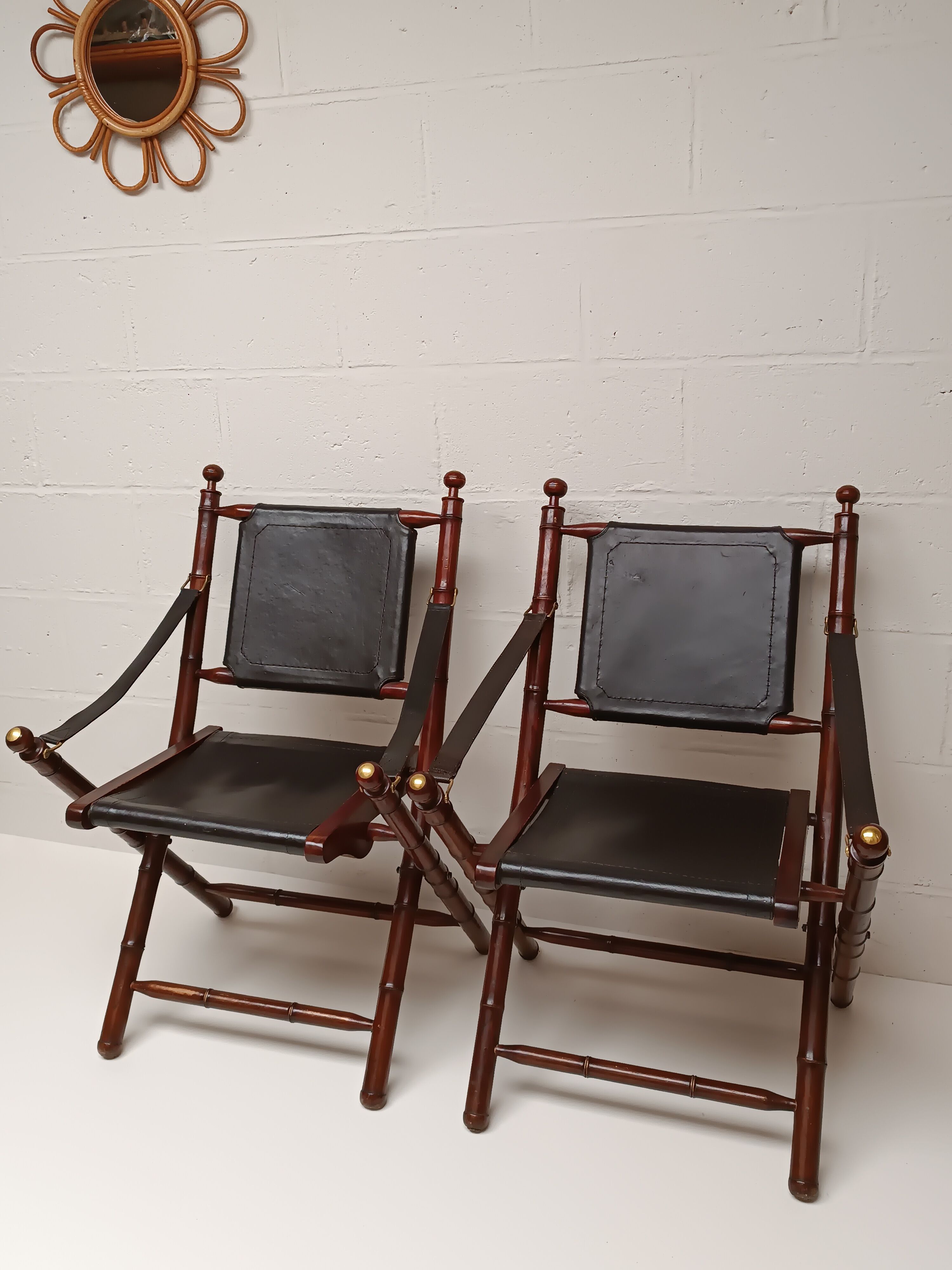Pair of vintage "safari" folding armchairs in mahogany and leather