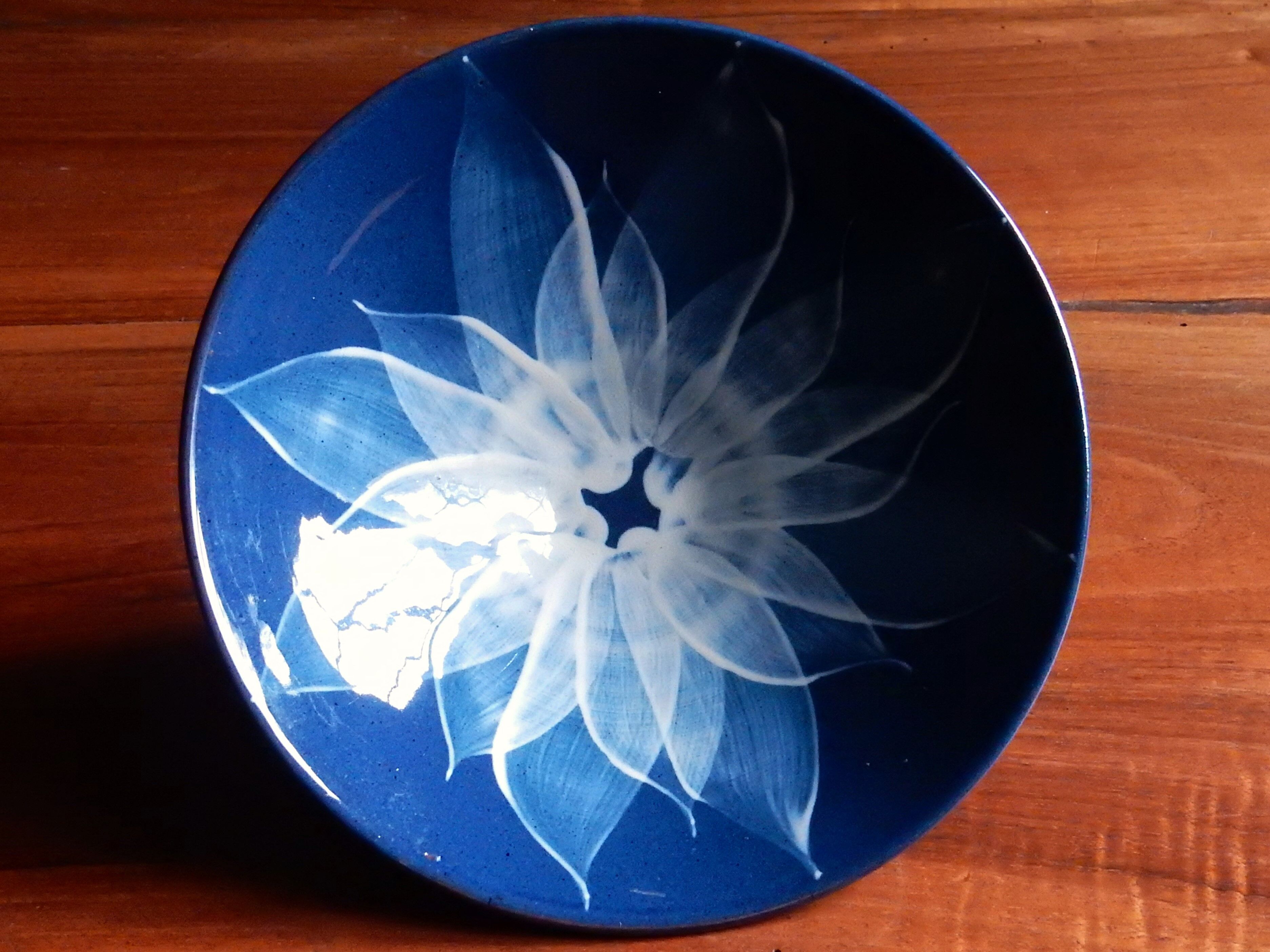 Empty pocket, blue ceramic bowl minimalist floral pattern