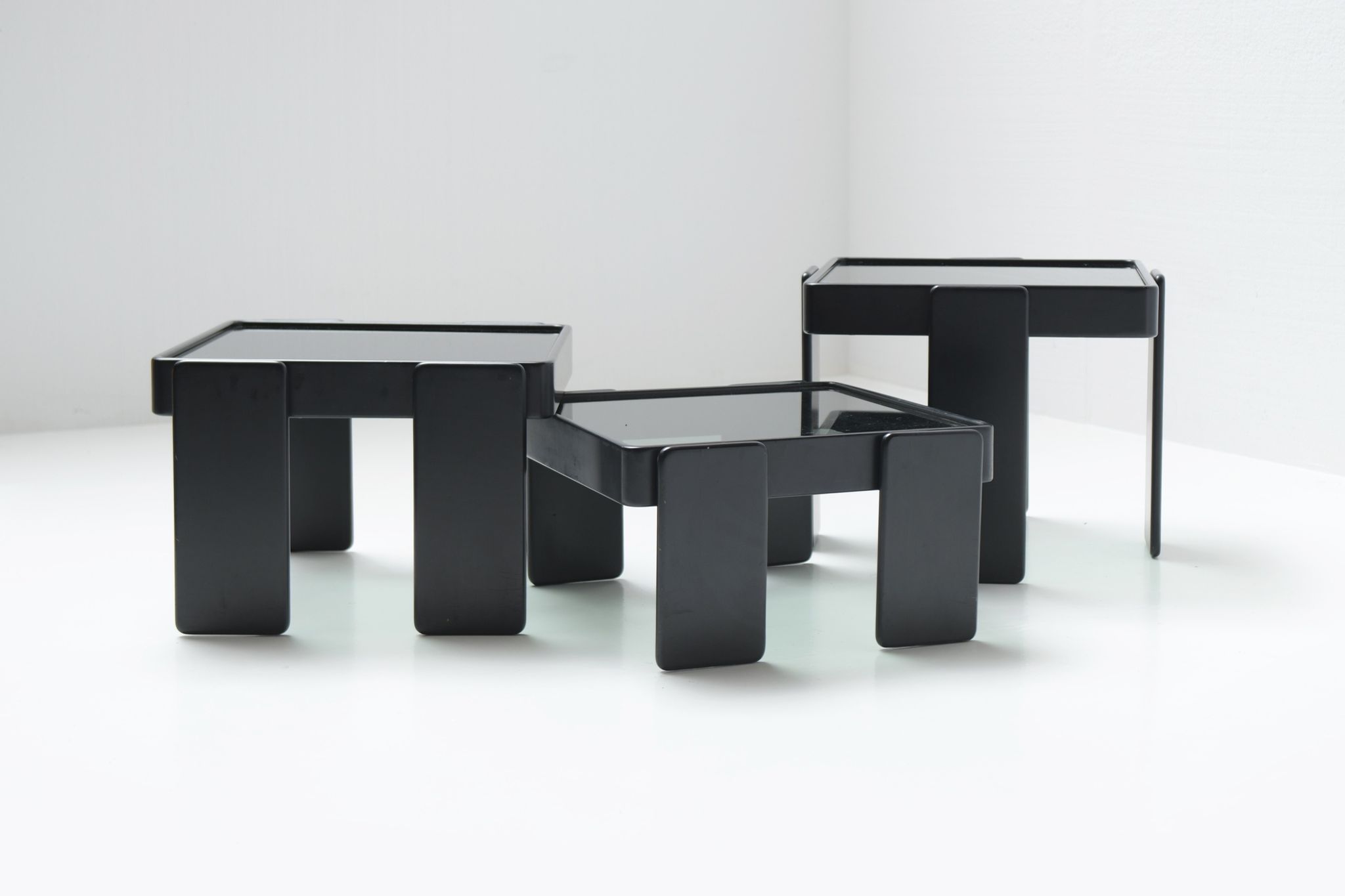 Nesting tables in black by Gianfranco Frattini for Cassina Italy