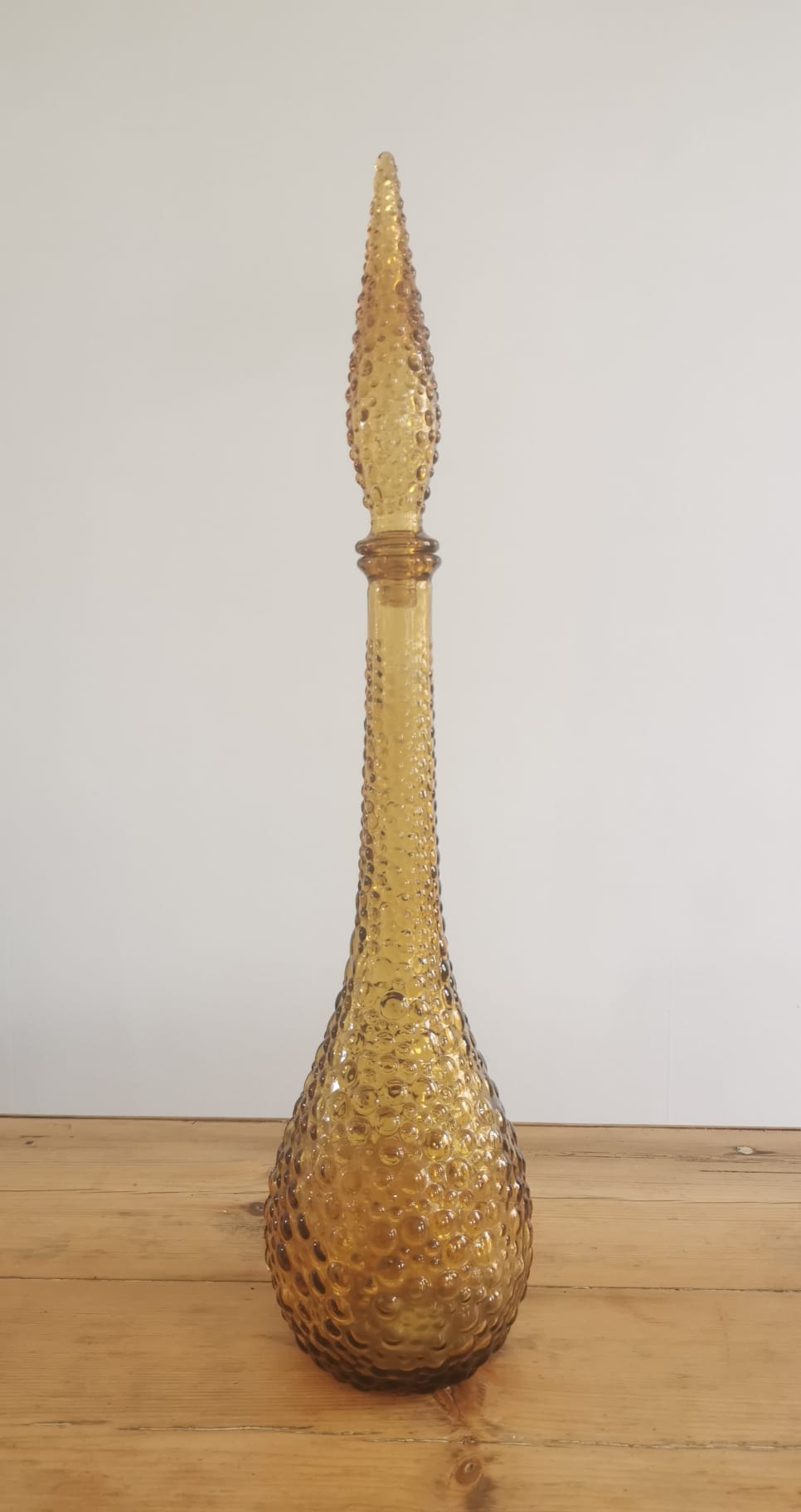 Amber-colored empoli glass decanter