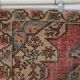 Vintage Turkish rug in beige and red with oriental design, 135 × 210 cm