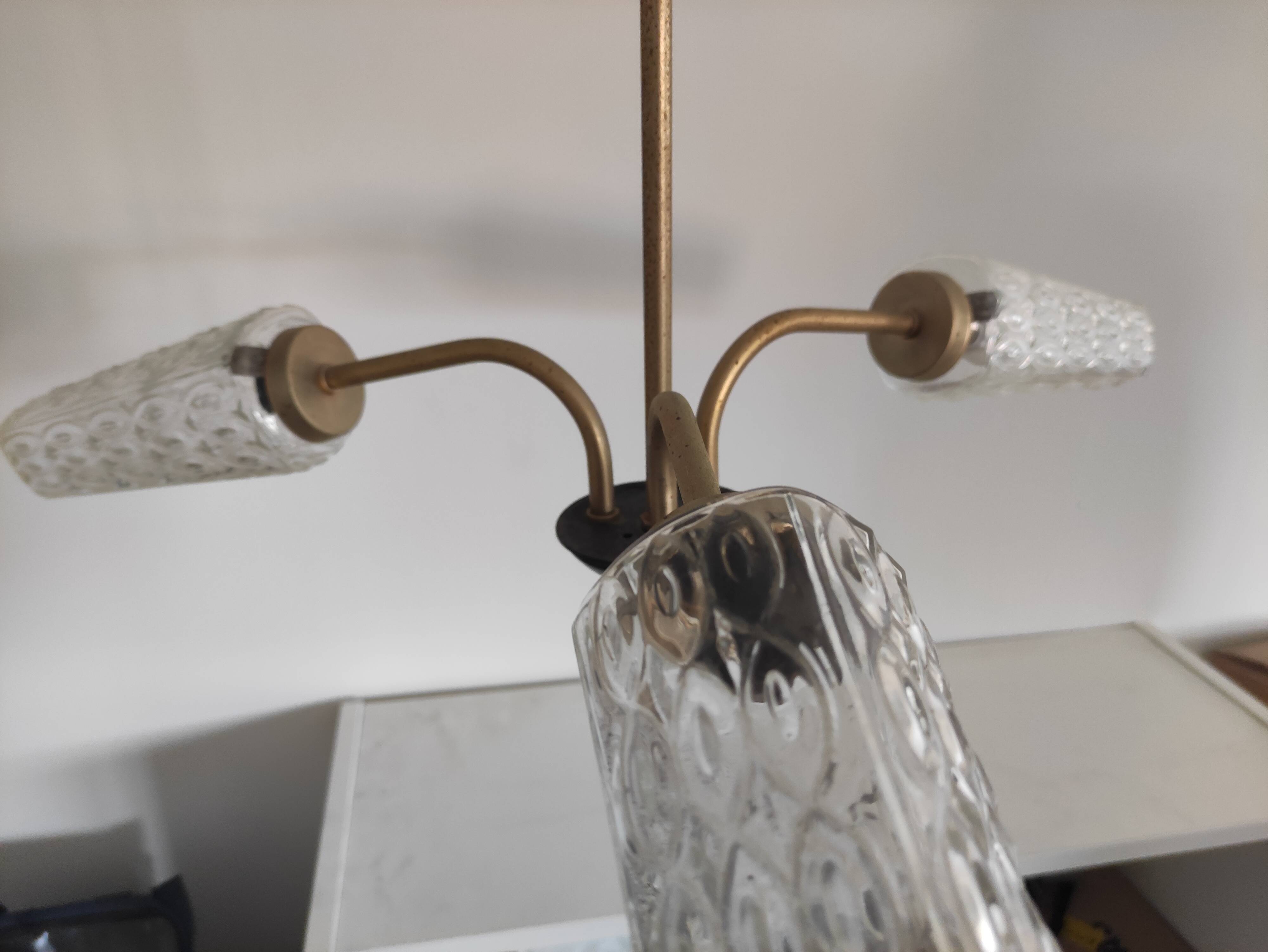 3-light glass globe chandelier, known as "tulip" glass.