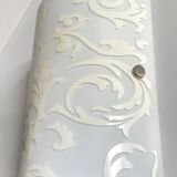 Polished and screen-printed glass sconce by eglo