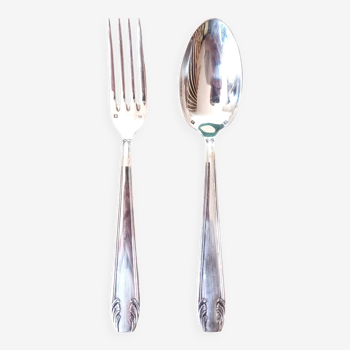 Duo of silver metal cutlery